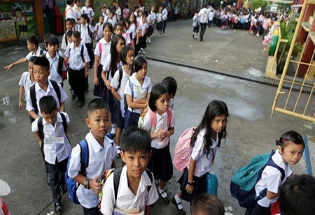 Students return to school as the Philippines prepares to test a new K–10 curriculum